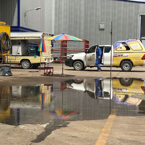 งานแก้ไขน้ำขังที่ผิวพื้นถนนคอนกรีต และยกปรับระดับลานคอนกรีต โรงงานในนิคมอุตสาหกรรมอีสเทิร์นซีบอร์ด